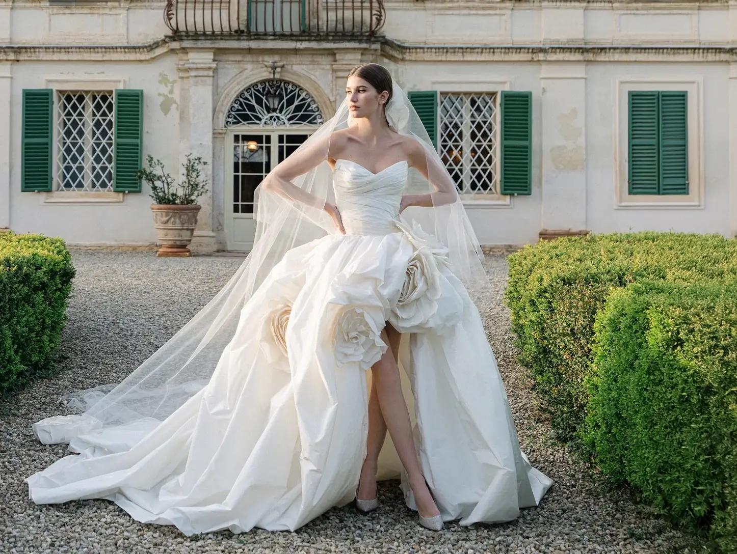 Model wearing a white wedding gown