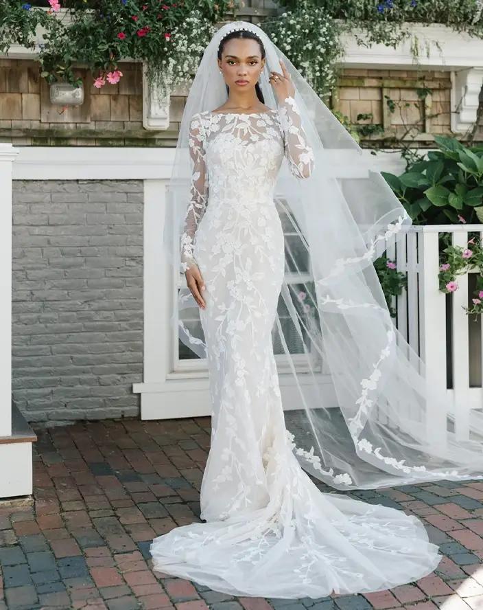 Model wearing a white Anne Barge gown